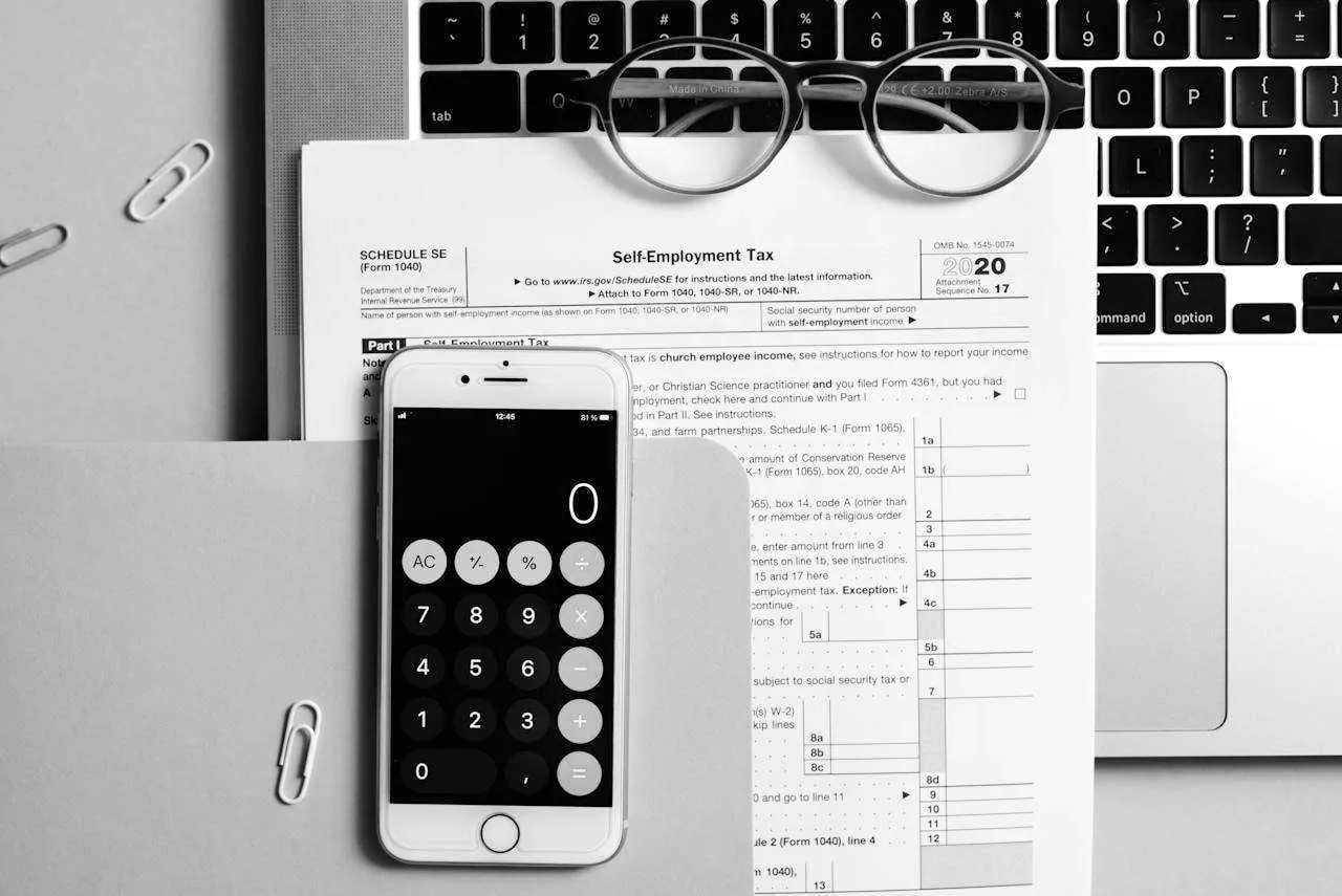 Tax documents and a calculator on a desk, Ottawa tax services